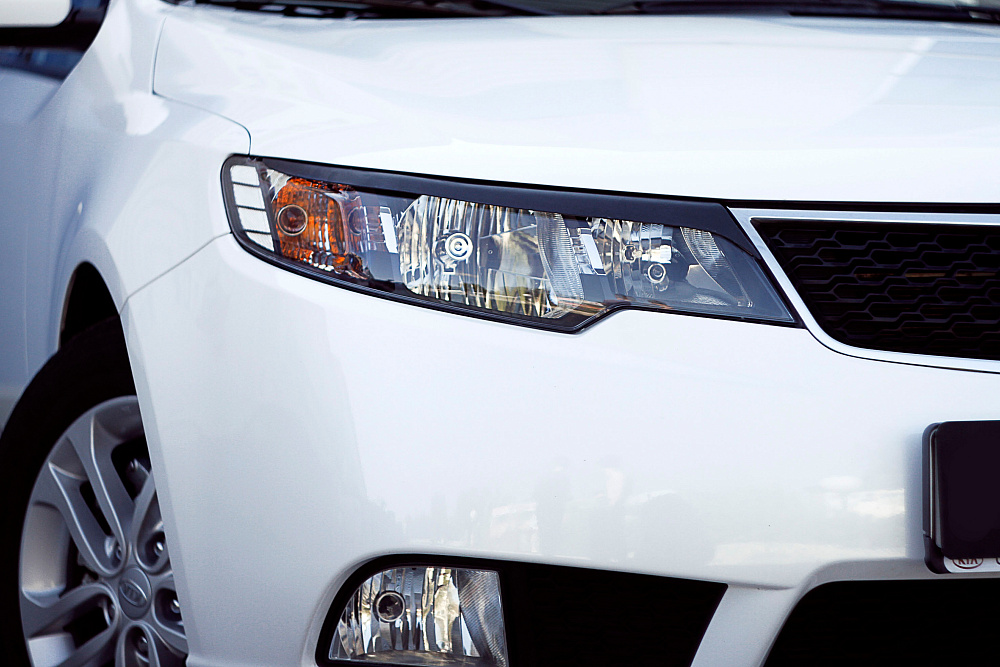 картинка Kia Cerato Forte 2008—2013 Накладки на передние фары (реснички) компл.-2 шт. от магазина  StreetTuning