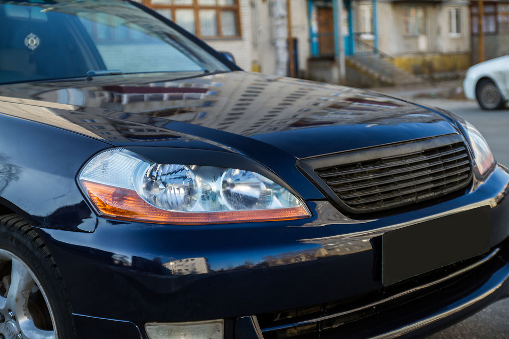 картинка Toyota Mark II 110 2000—2004 Накладки на фары (реснички) компл.-2 шт. от магазина  StreetTuning