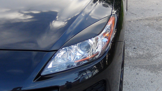 картинка Mazda 3 (седан, хэтчбэк) 2010—2013 Накладки на передние фары (реснички) компл.-2 шт. магазин  StreetTuning 