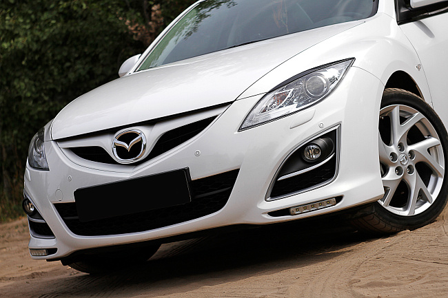 картинка Mazda 6 2010—2012 Накладки на передние фары (реснички) компл.-2 шт. магазин  StreetTuning 